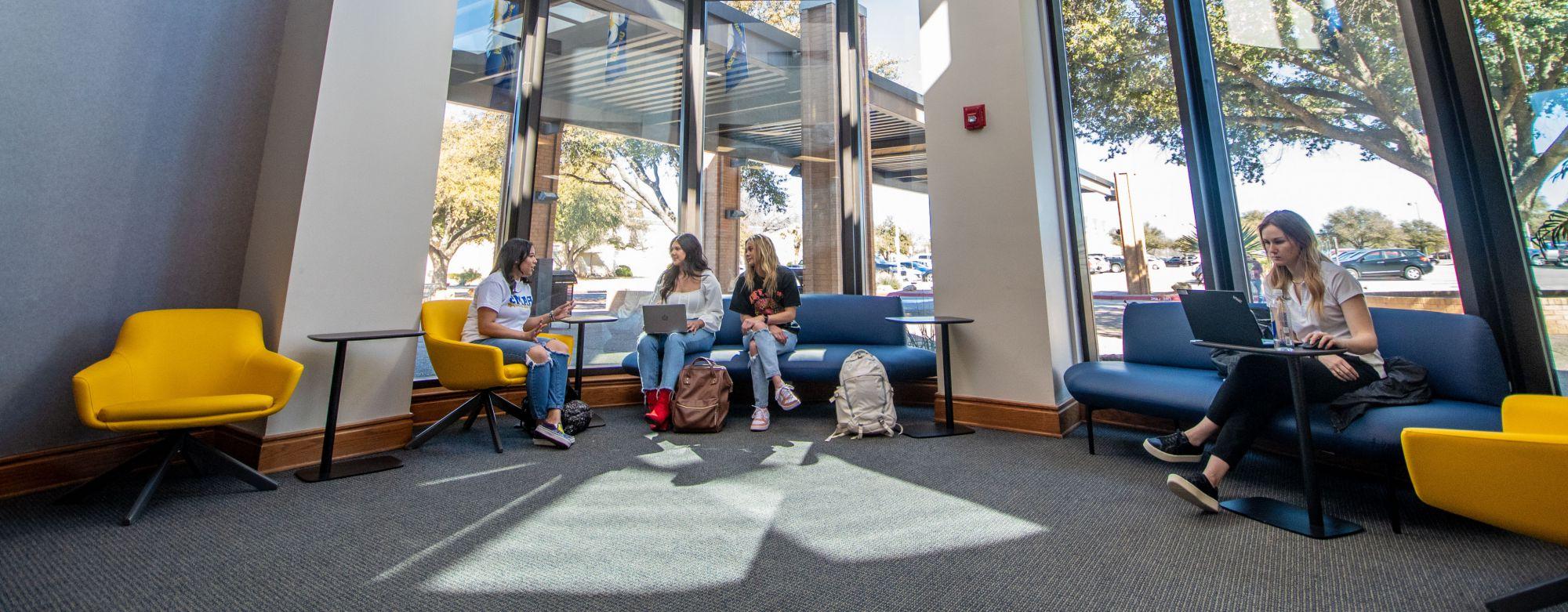Students talking in the Houston Harte University Center